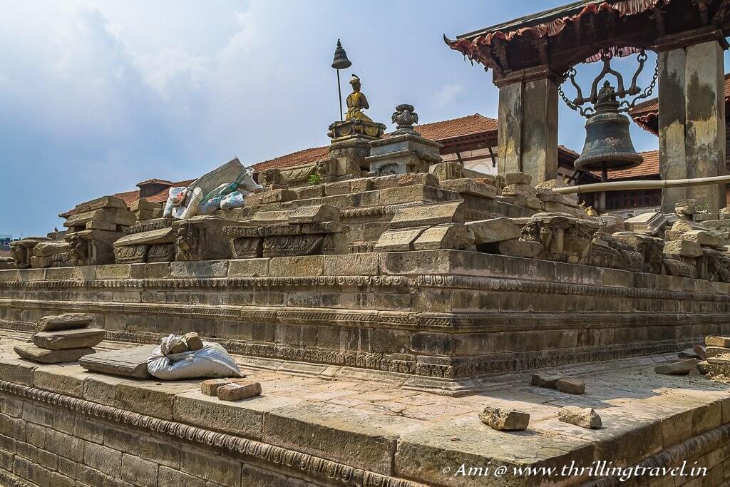 Taleju Bell with the destroyed Vatsala Devi Temple in Bhaktapur Durbar Square