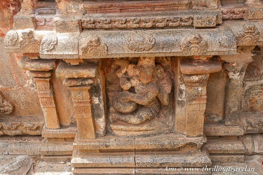 A Gana depicted on the walls or is it the kid Krishna eating from a pot of curds? 