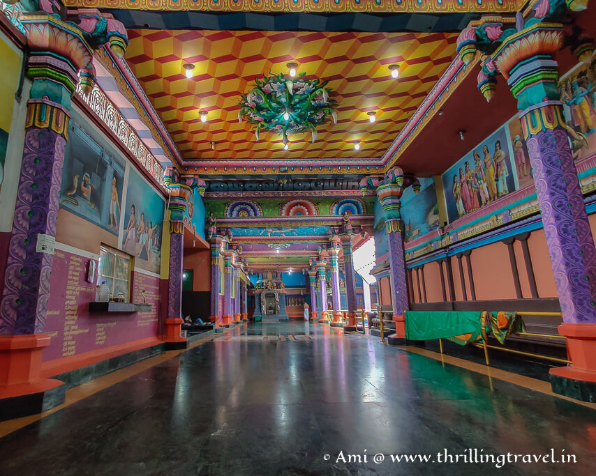 The vibrant corridor inside Nainativu temple