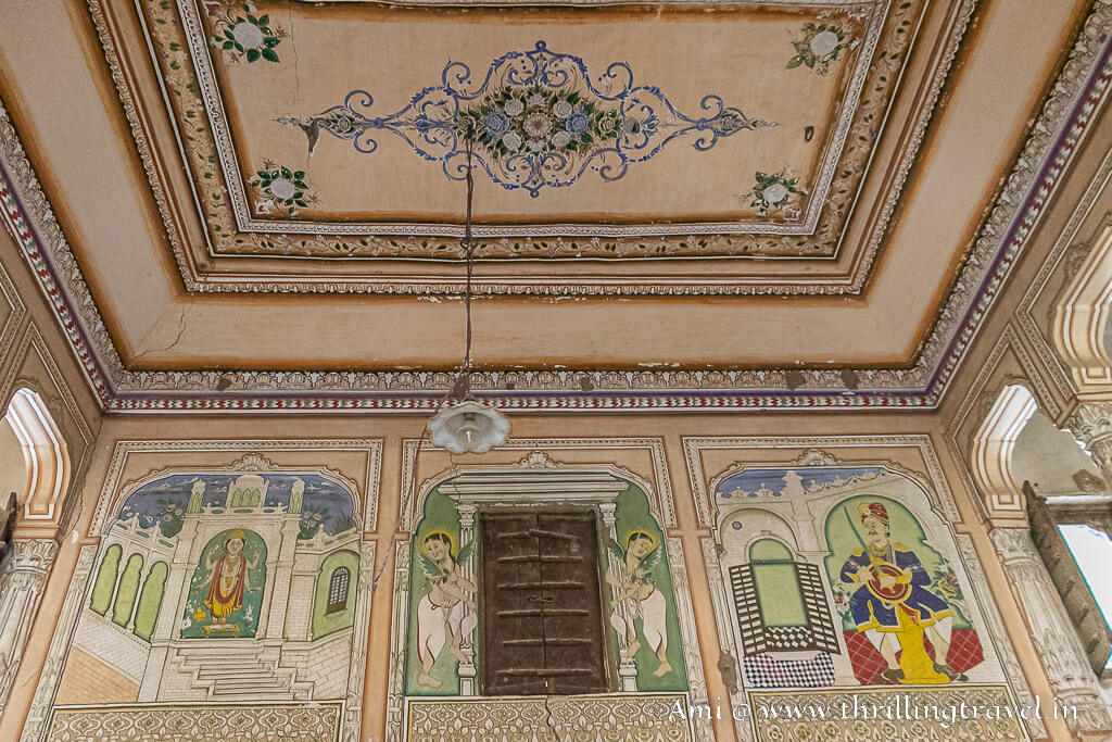The pretty windows framed by frescoes in Bansilal Bhagat ki haveli, Nawalgarh, Rajasthan