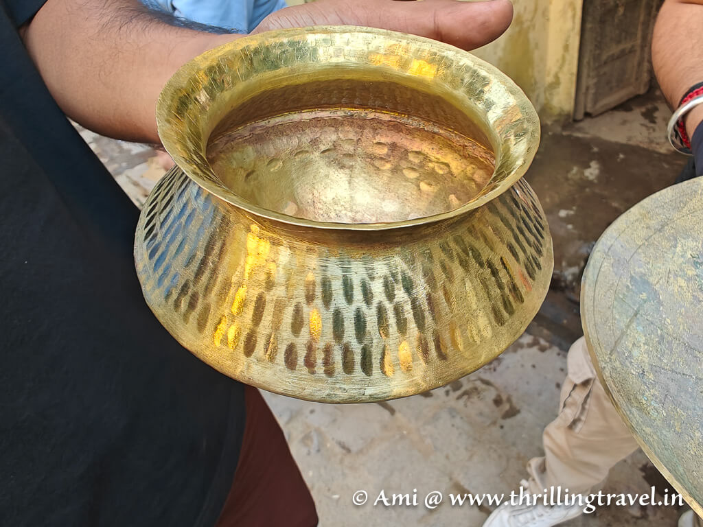 A finished brass utensil with the aesthetic design that actually helps in uniform heat conduction