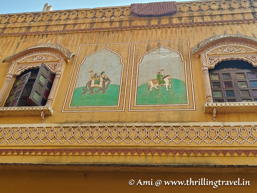Frescoes, windows and a pretty facade