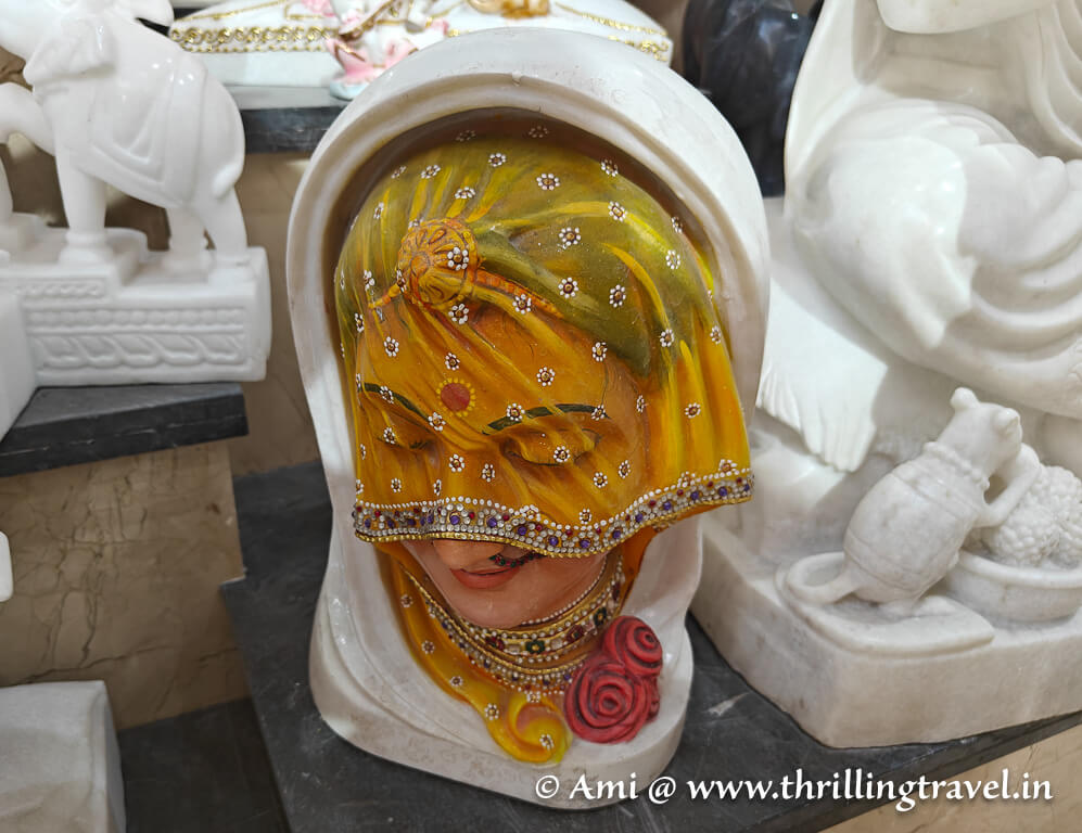 A veiled statue made completely with marble - one of the art pieces of Khazane walon ka raasta