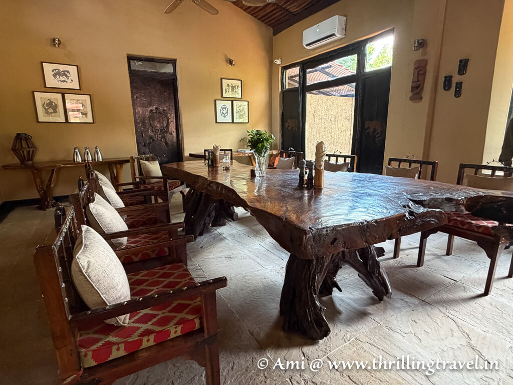 The earthy Dining room with furniture made with recycled wood