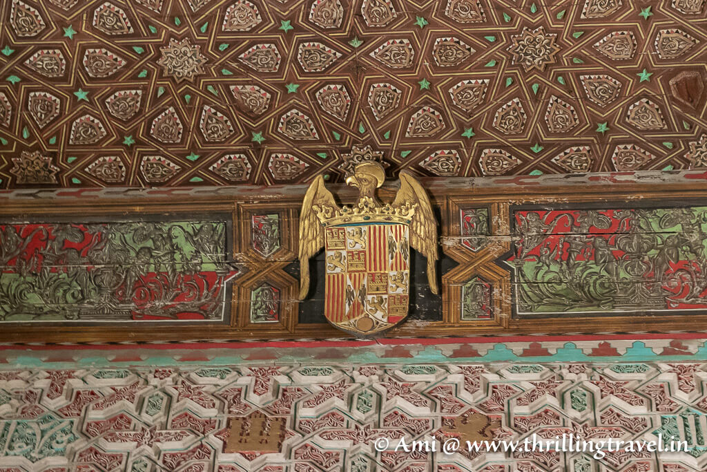 Close-up of the emblem on the ceiling of the Catholic King's chamber