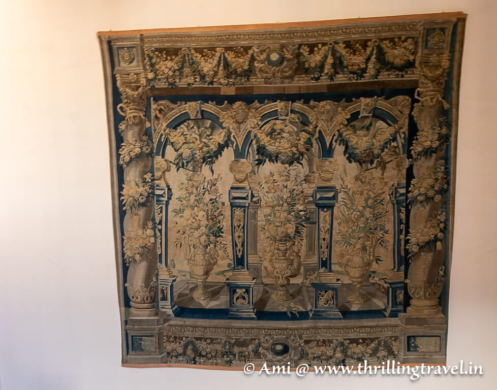 The 17th century tapestry that you can see on the way up the stairs