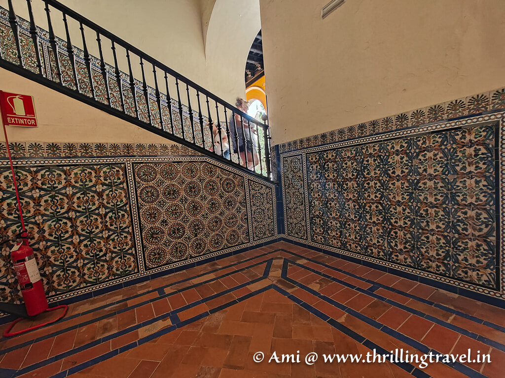 The tiled staircase that leads to the Upper palace inside the Real Alcazar of Seville, Spain